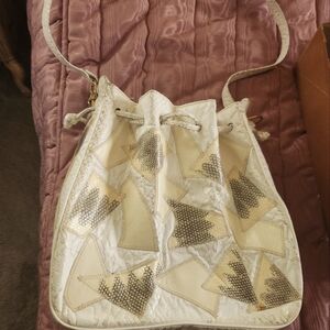 White leather and cream snake skin satchel bag.